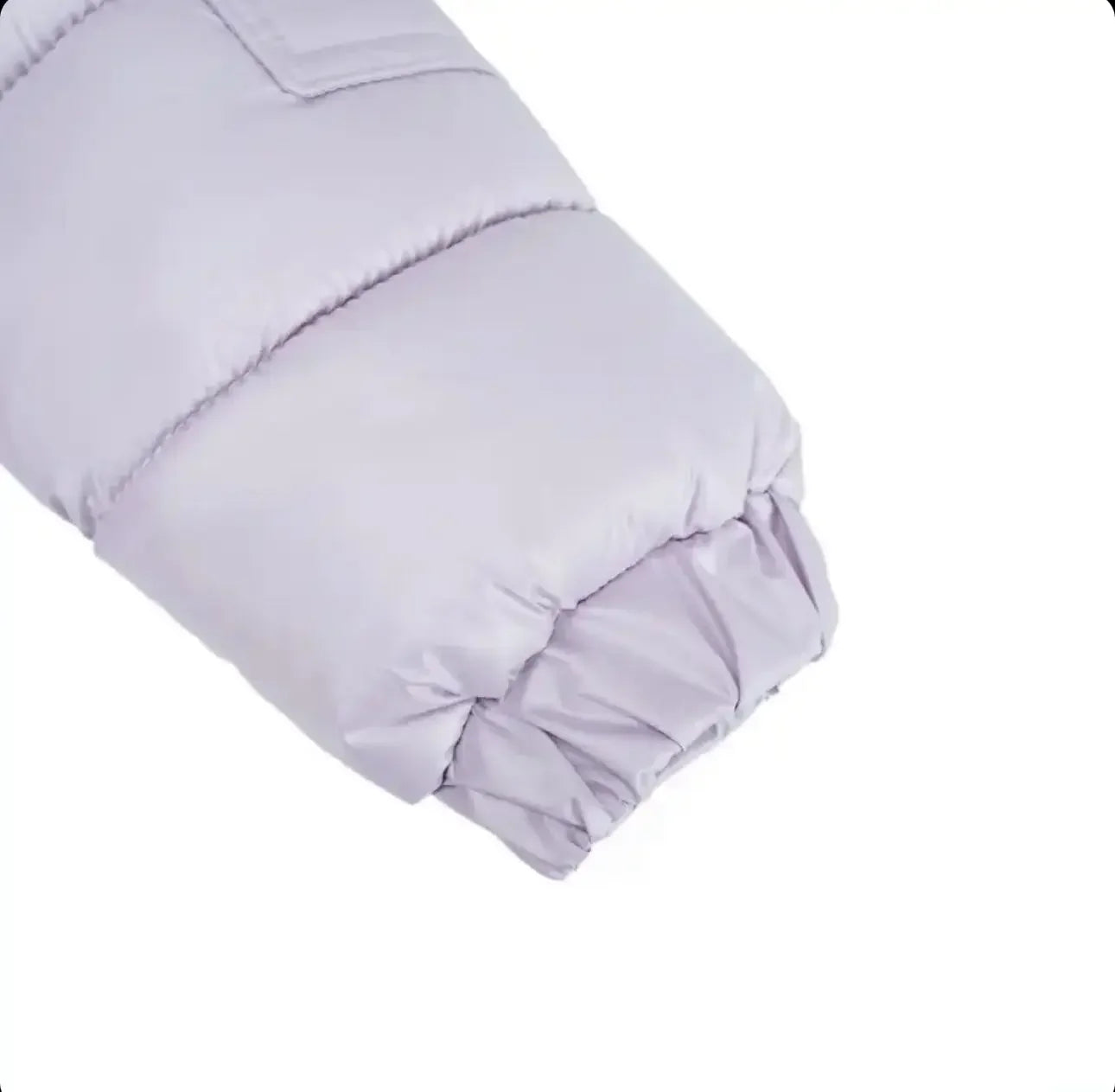 Light purple padded winter jacket sleeve with elastic cuff against white background