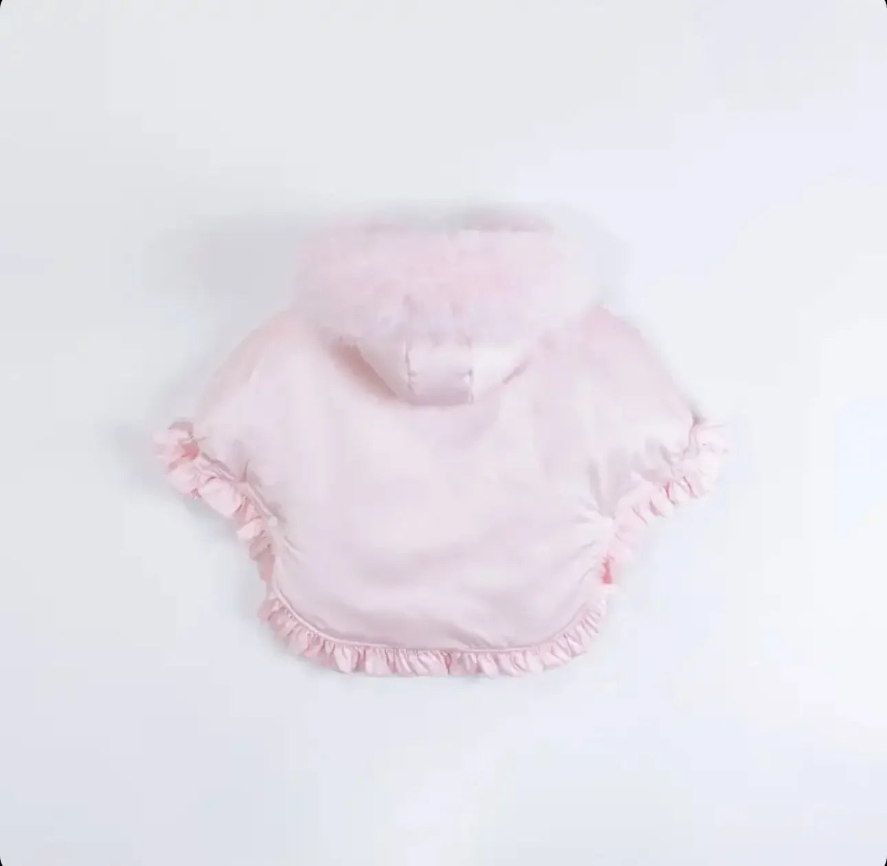 Soft pink baby jacket with fluffy hood and ruffled edges on white background