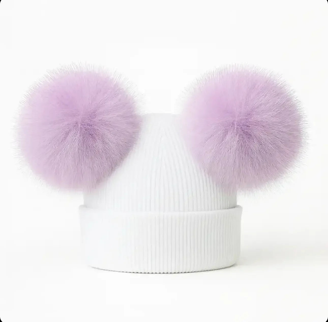White knit beanie hat with two large fluffy lavender pom-poms on top