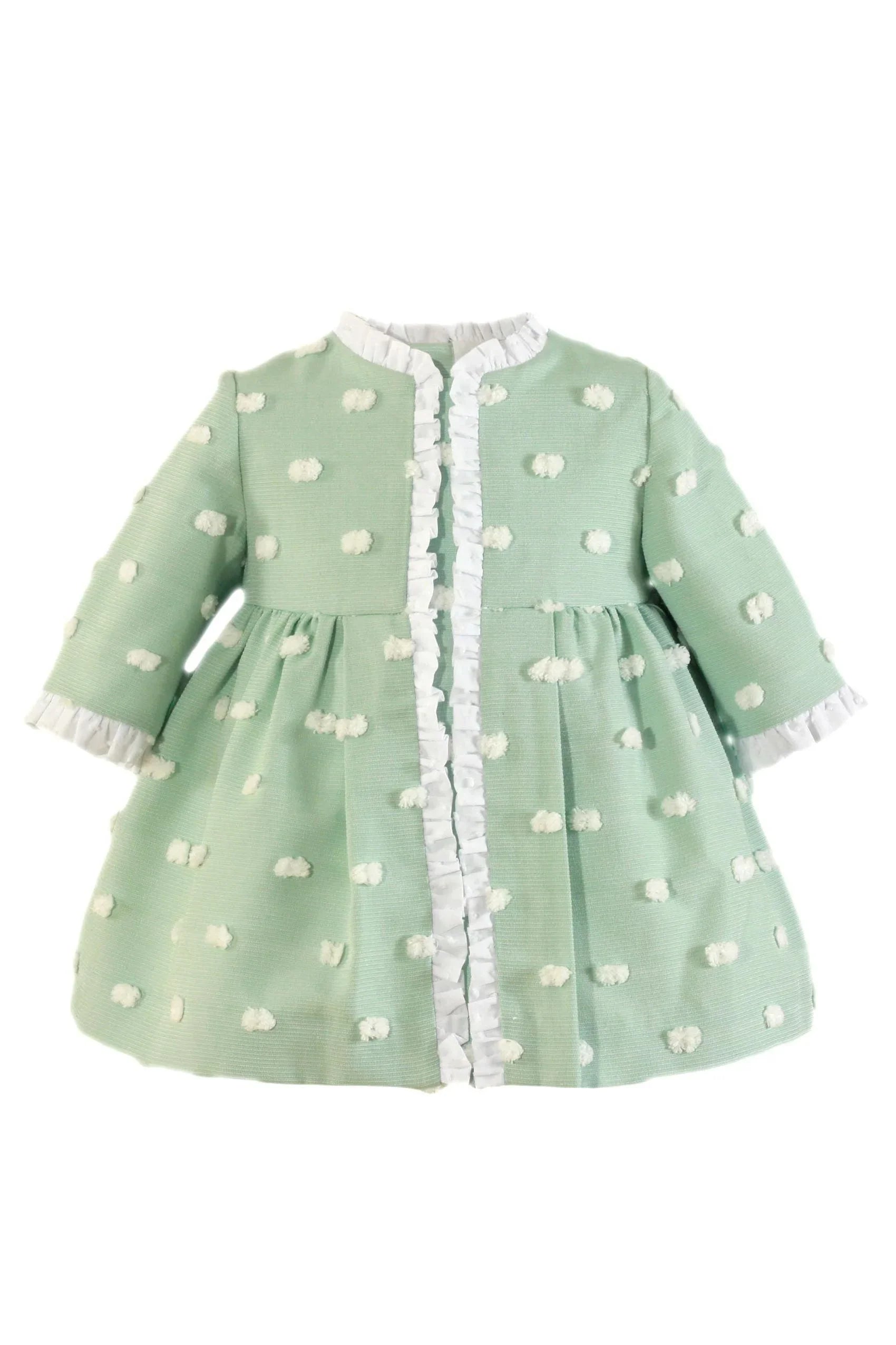 Baby girl's green dress with white raised polka dots and white ruffle trim on collar and front