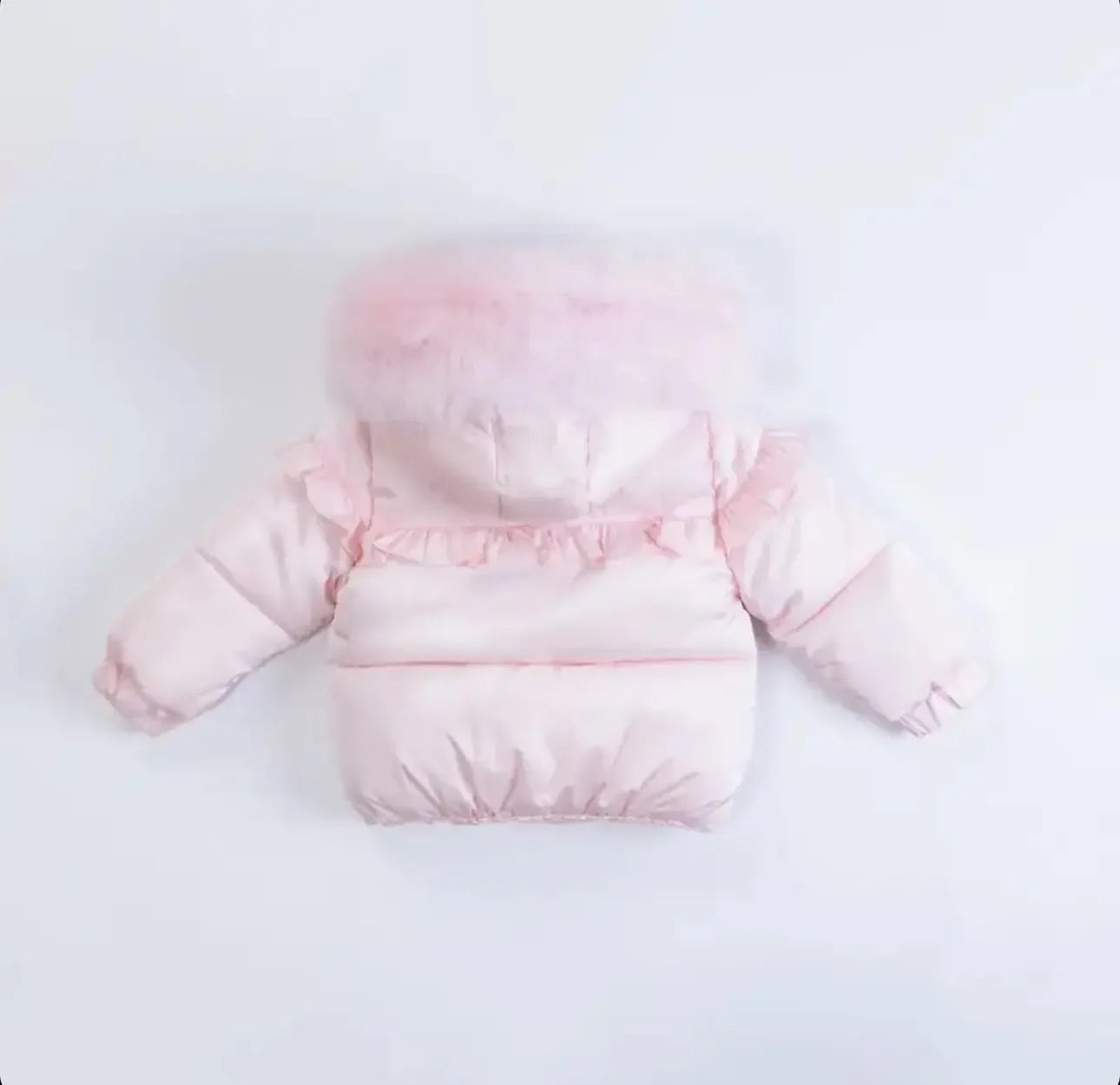 Back view of a pink baby puffer jacket with fur-trimmed hood and ruffle details on arms