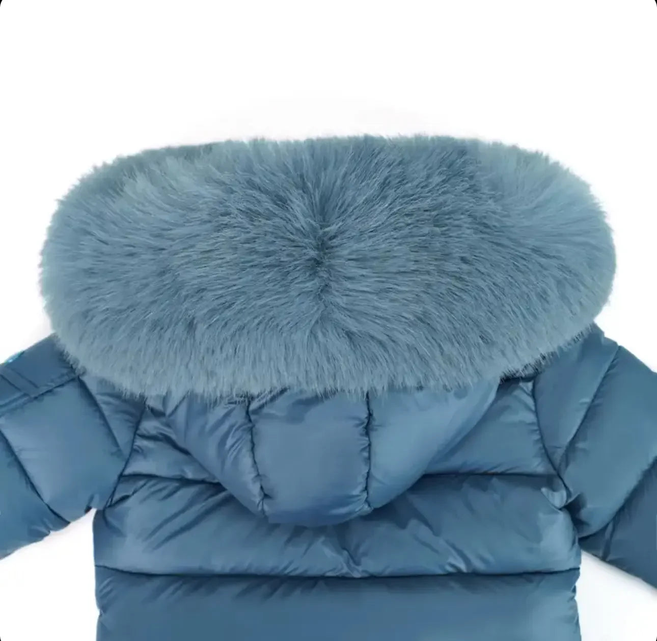 Blue puffer jacket with large fluffy fur hood for winter warmth
