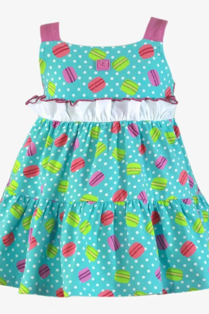Girls turquoise sundress with colorful macaron and white polka dot pattern and pink straps