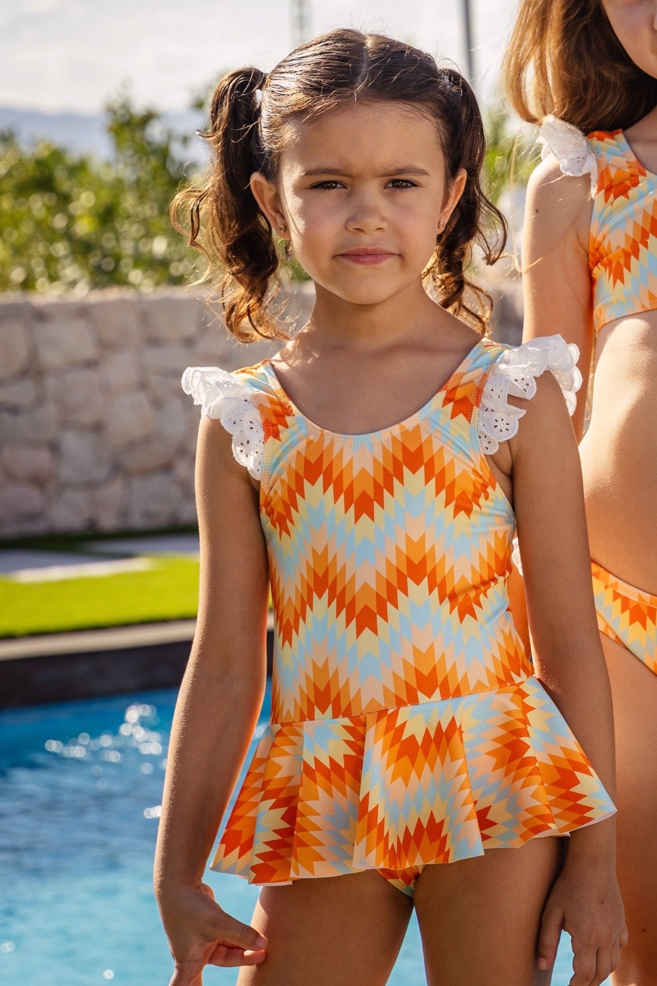 SS25 Rochy Girls Orange Abstract Swimming Costume - Dainty Delilah
