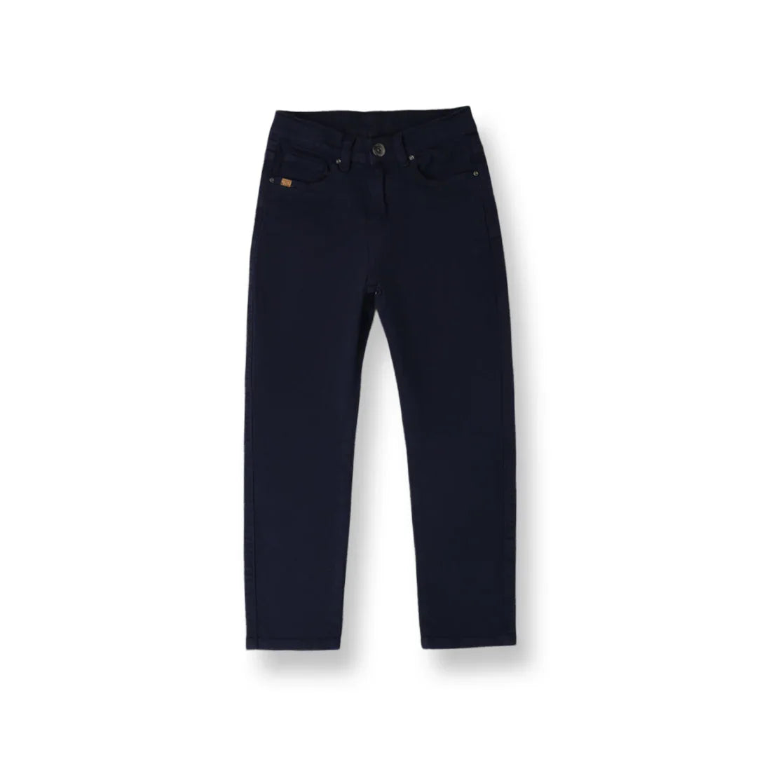 Dark navy blue slim-fit jeans with front pockets and button closure on white background