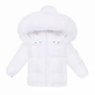 White puffer jacket for kids with faux fur hood and front zipper on plain white background