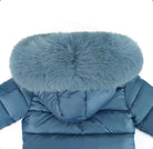 Blue puffer jacket with large fluffy fur hood for winter warmth