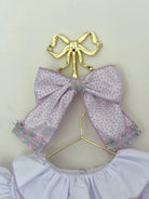 SS26 Naxos Baby Girls Lilac Croc Hairbow Naxos