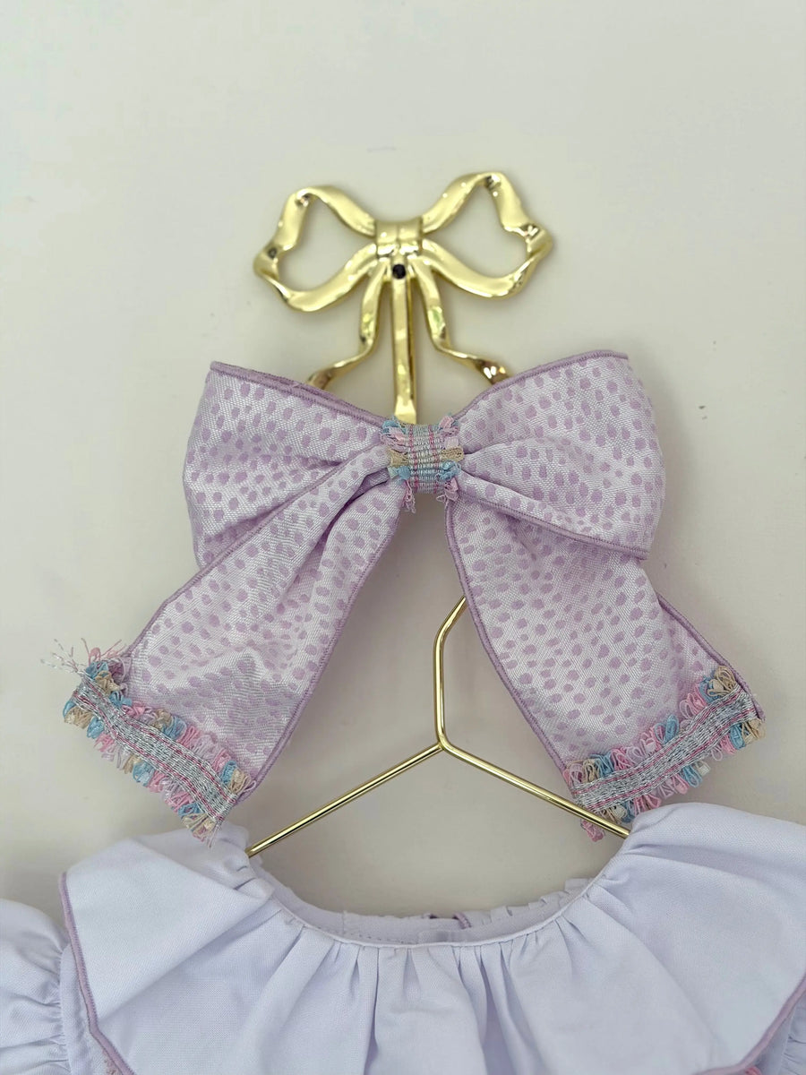 SS26 Naxos Baby Girls Lilac Croc Hairbow, handcrafted in Spain, one size fits all, perfect for stylish occasions and everyday wear.