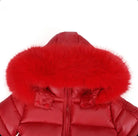 Close-up of red puffer winter jacket with fluffy fur-trimmed hood