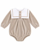 Baby boys’ beige velour sailor collar romper with white collar, beige piping, long sleeves and traditional bubble silhouette.