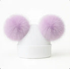 White knit beanie hat with two large fluffy lavender pom-poms on top