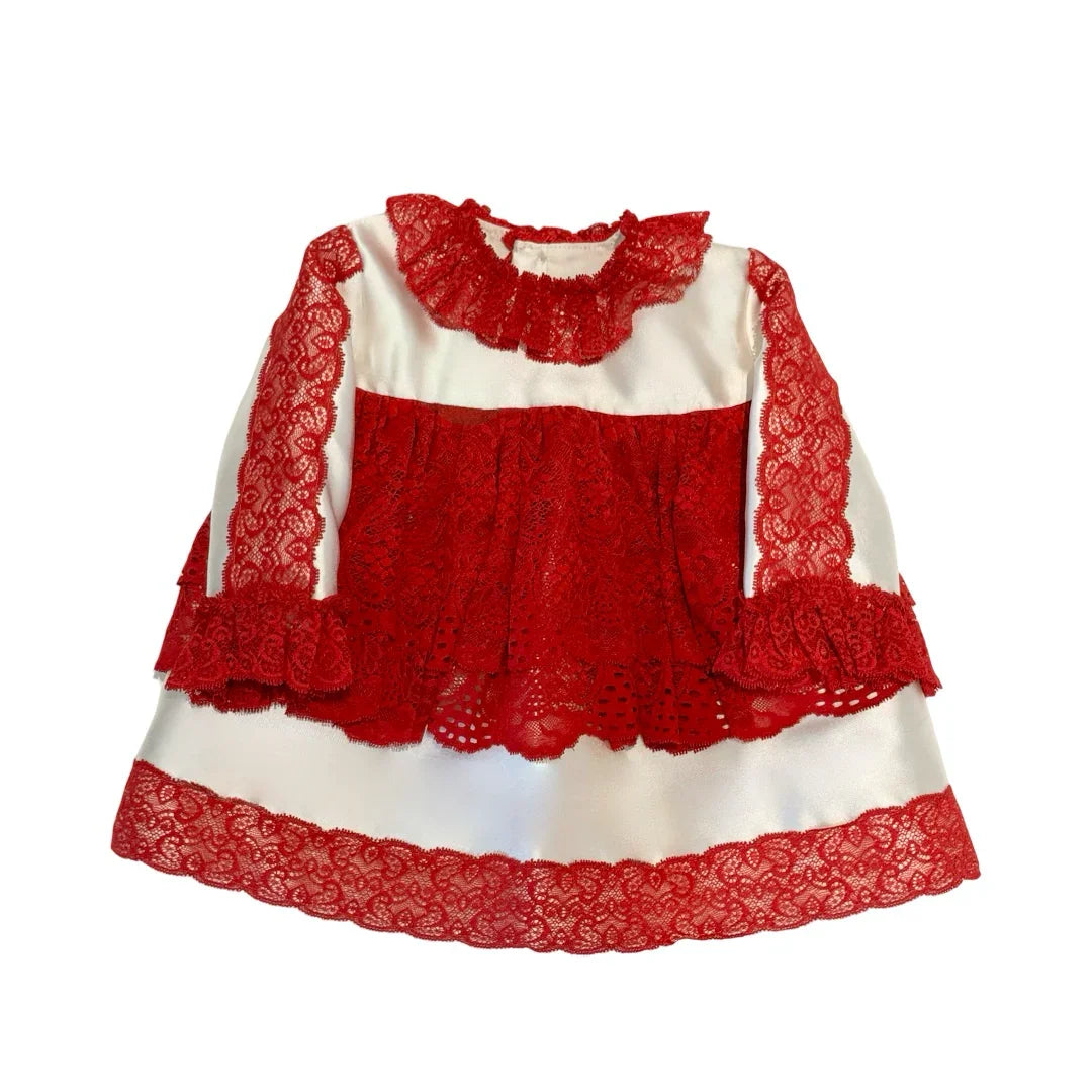 Vintage-style white dress with red lace trim, ruffled collar, and long sleeves