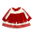 White baby dress with red lace overlay, ruffled collar, and long sleeves on white background
