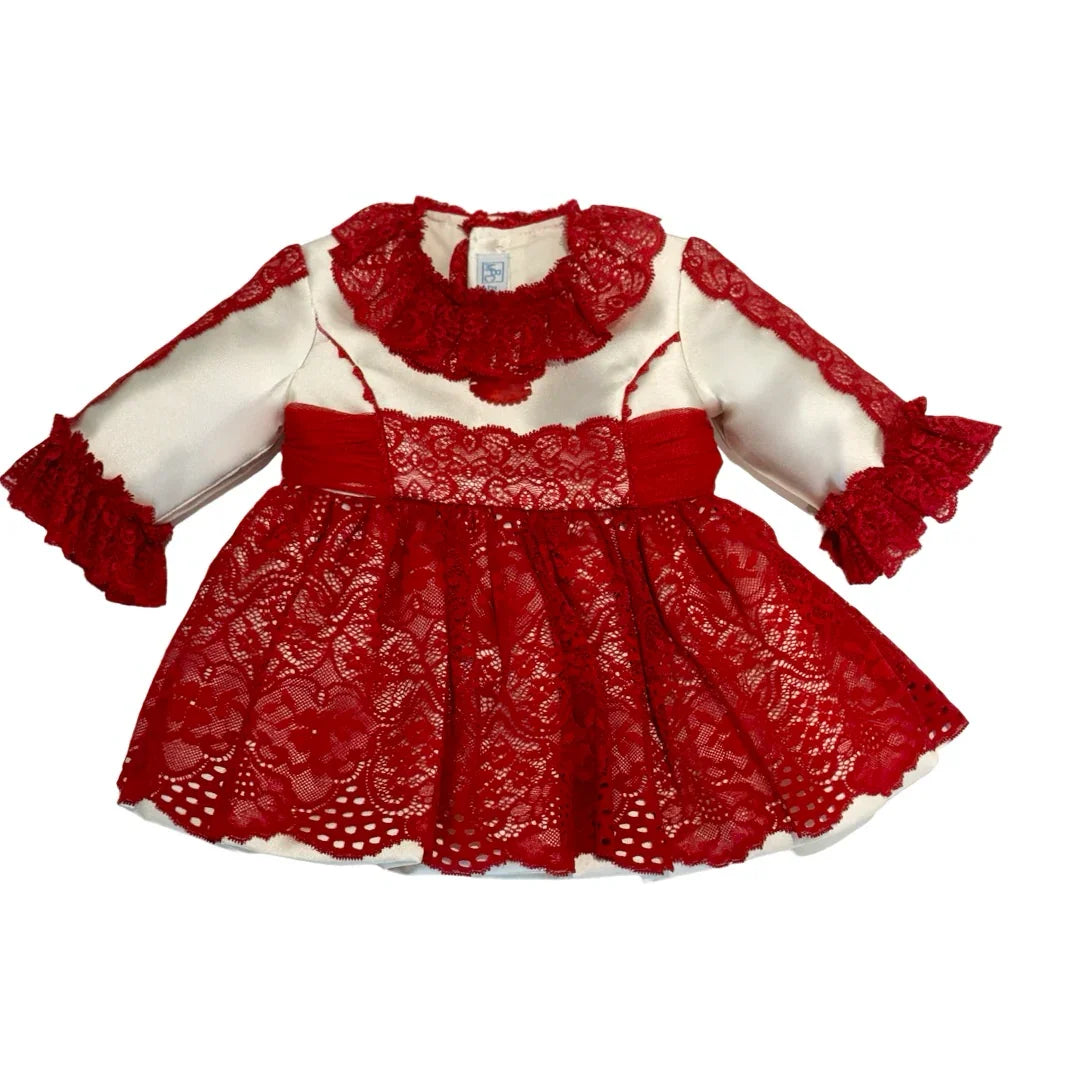 Baby girl's ivory dress with red lace overlay, ruffled collar, and long sleeves