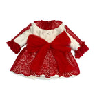 White baby dress with red lace trim and large red bow on back, festive infant clothing