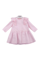 Baby pink long sleeve dress with ruffles on shoulders and pearl embellishments