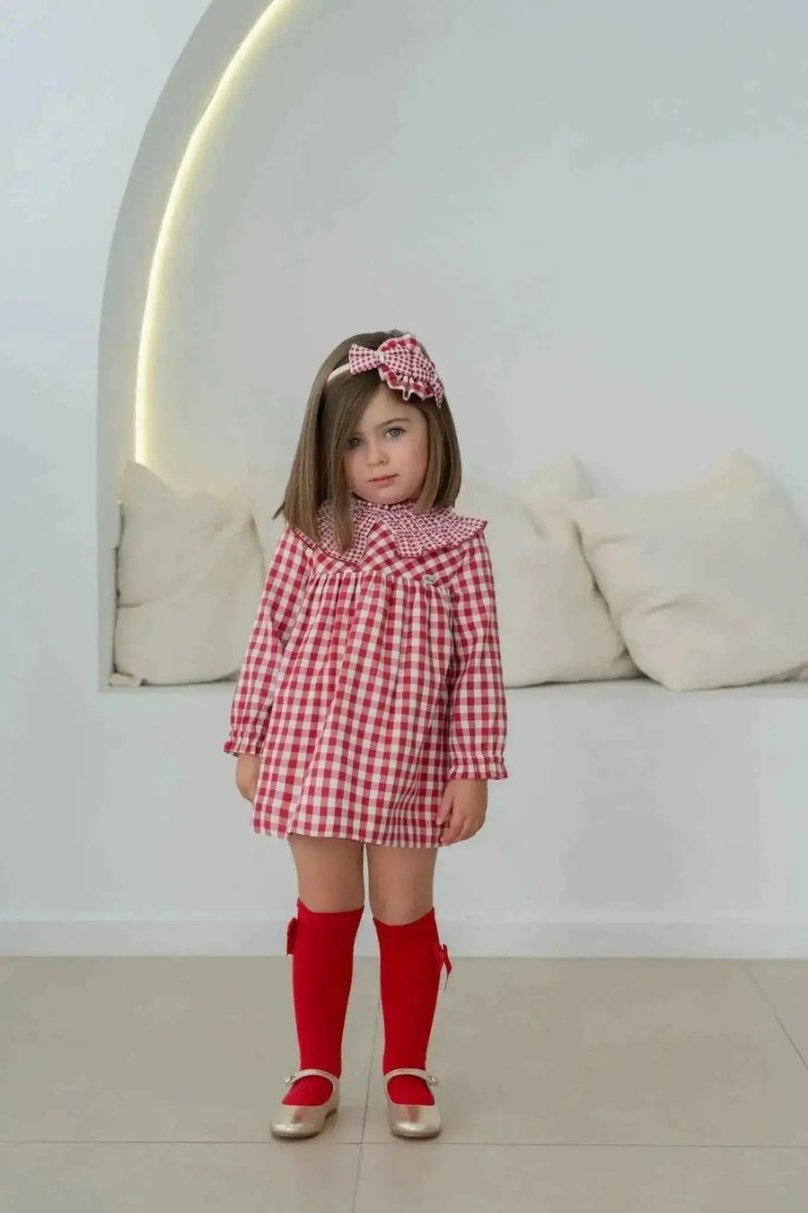 AW26 Miranda Girls Red Gingham Dress - Stylish summer dress featuring ruffled neckline, available in sizes 3 to 10 years.