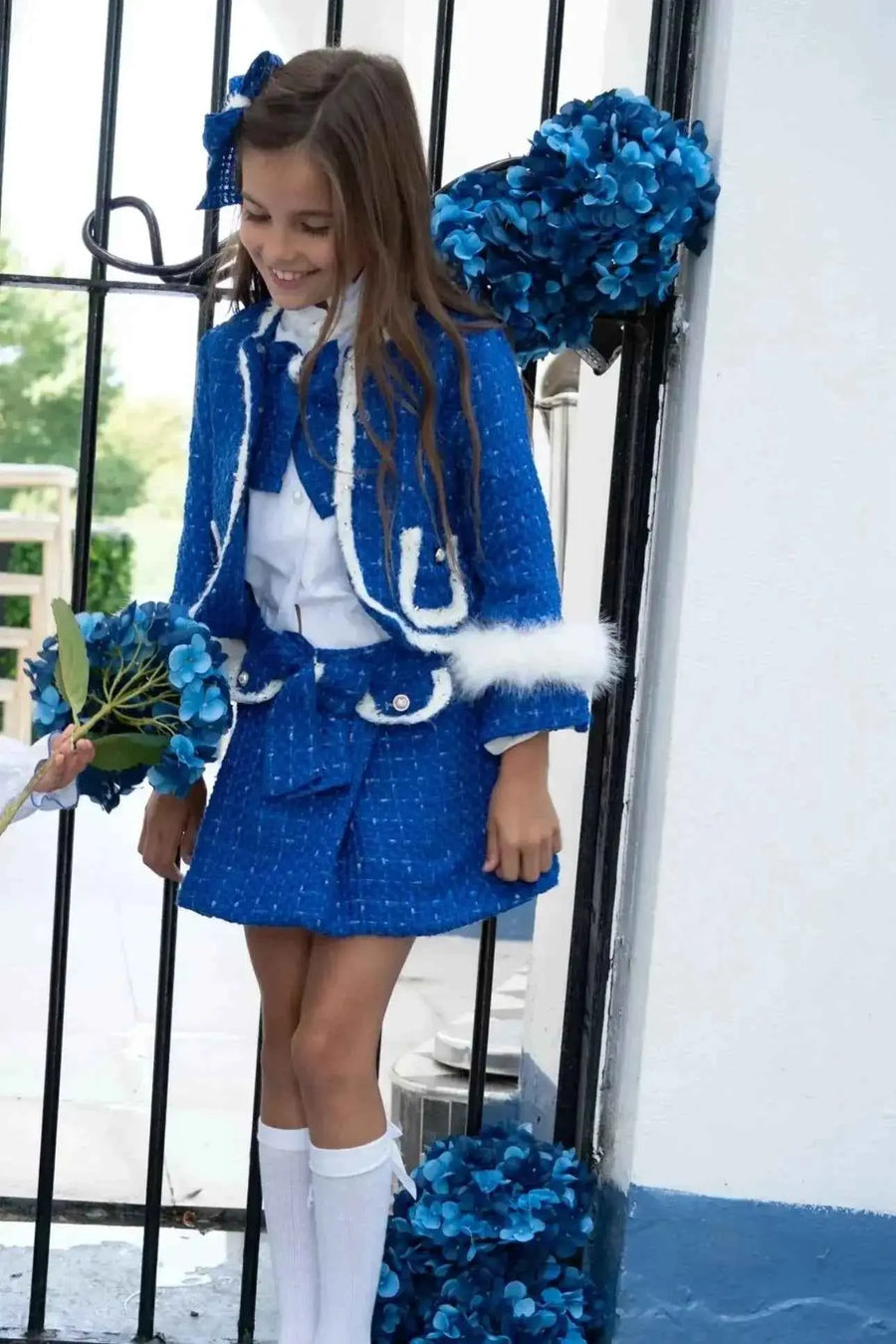 AW26 Naxos Girls Royal Blue Tweed Blazer & Skirt Set, tailored fit blazer and playful skirt, sizes 3-16 Years available.