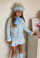 AW26 Rahigo Exclusive baby blue houndstooth girls blazer and skirt set with white frill shirt, matching beret with faux fur pom pom and knee-high socks, Spanish children’s boutique outfit for girls aged 2–12 years.