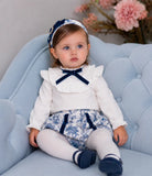 Shop the AW26 Rochy baby girls blue toile jam pant set with ivory frill blouse, navy velvet details and adjustable waist. Sizes 3M–4Y.