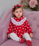 AW26 Rochy baby girls red romper with textured 3D white spot detailing and white sheer ruffle bib, sizes 3 months to 4 years