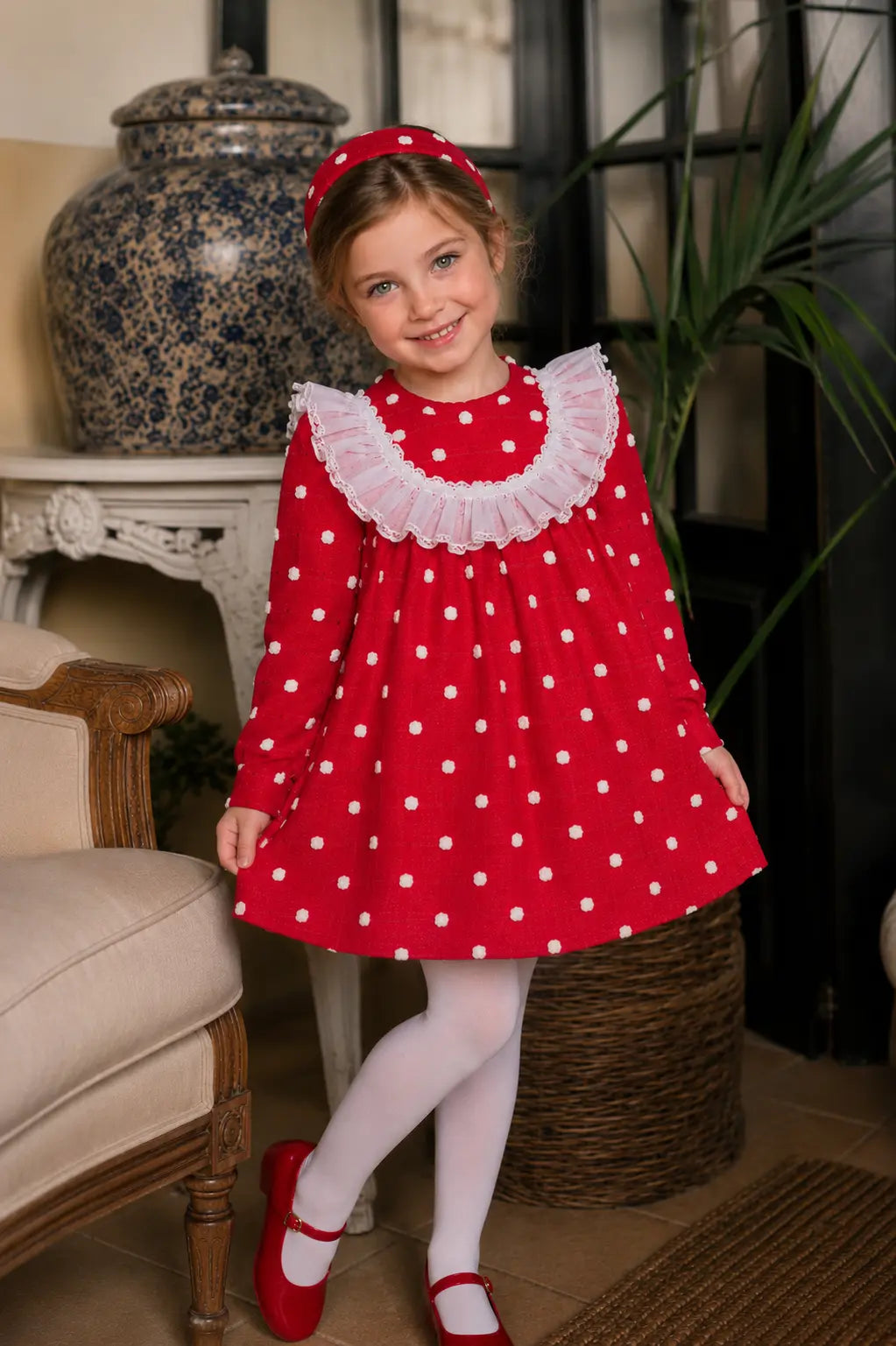 AW26 Rochy girls red dress with 3D white spot detailing and white sheer ruffle bib, sizes 4 to 14 years