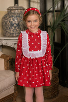 AW26 Rochy girls red dress with 3D white spot detailing, sheer ruffle bib and full gathered skirt, sizes 4 to 14 years