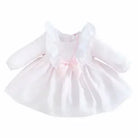Soft pink baby dress with long sleeves, frilled collar, and bow detail