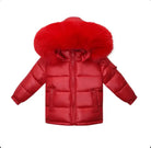 Red puffer jacket with shiny finish and large fluffy fur hood on white background