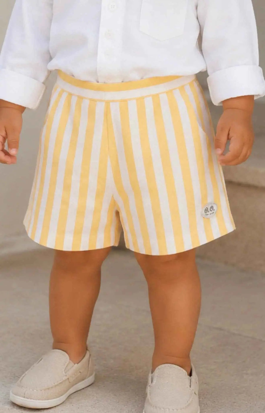 SS26 Babine Boys Yellow Stripe Shorts  
Knee-length yellow and white stripe shorts with elastic waistband. Available in sizes 2 Years, 4 Years, 5 Years.