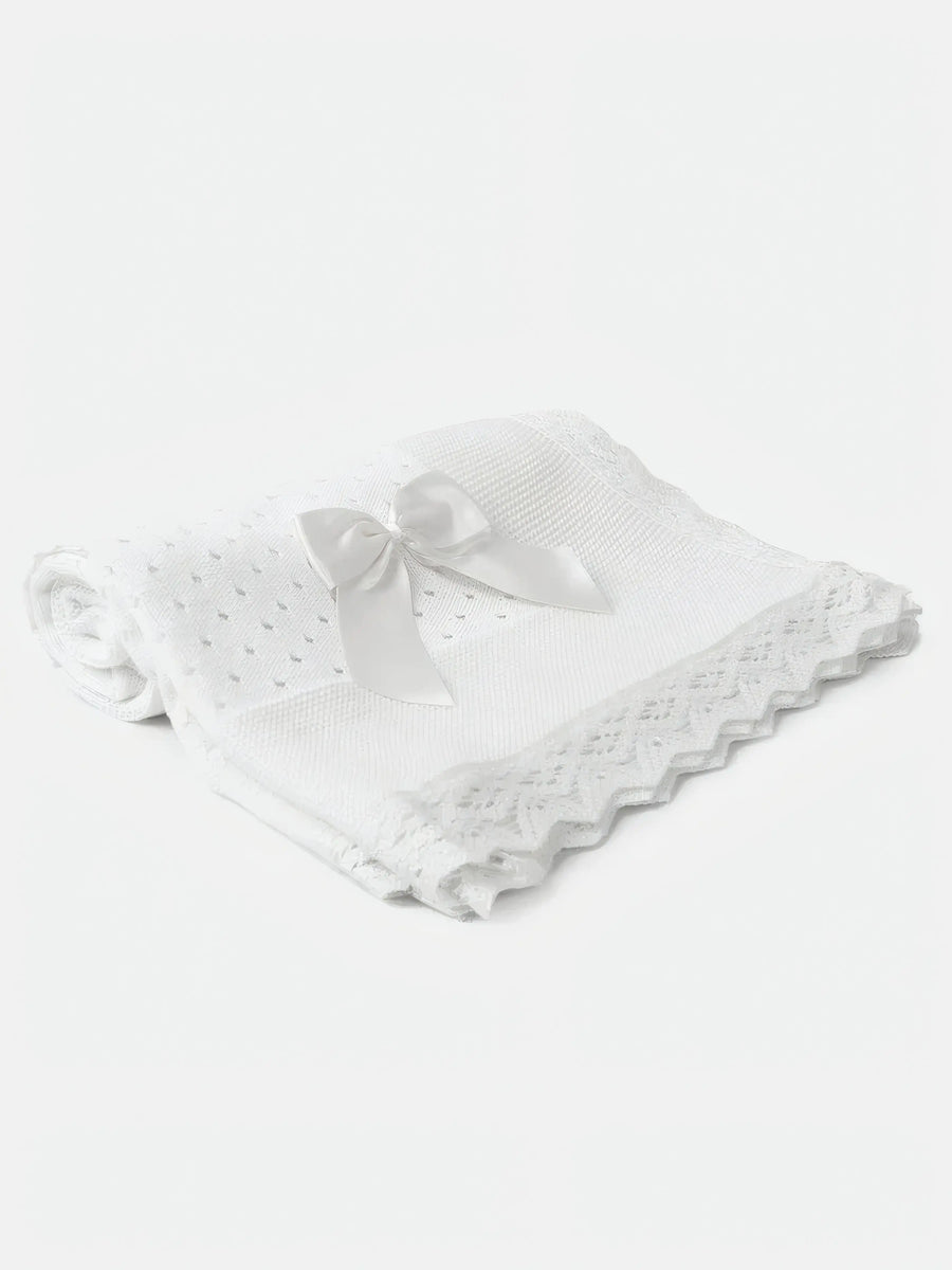 AW26 Baby Open Dot Knitted Spanish Blanket with Bow in White, featuring crochet lace edging and satin bow. One size available.