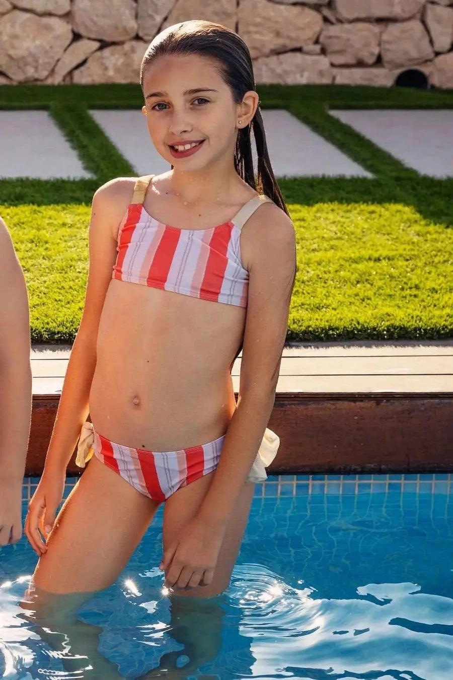 SS25 Rochy Girls Orange Swimming Bikini, vibrant design for girls aged 5 to 16 years, available in sizes 5-16.