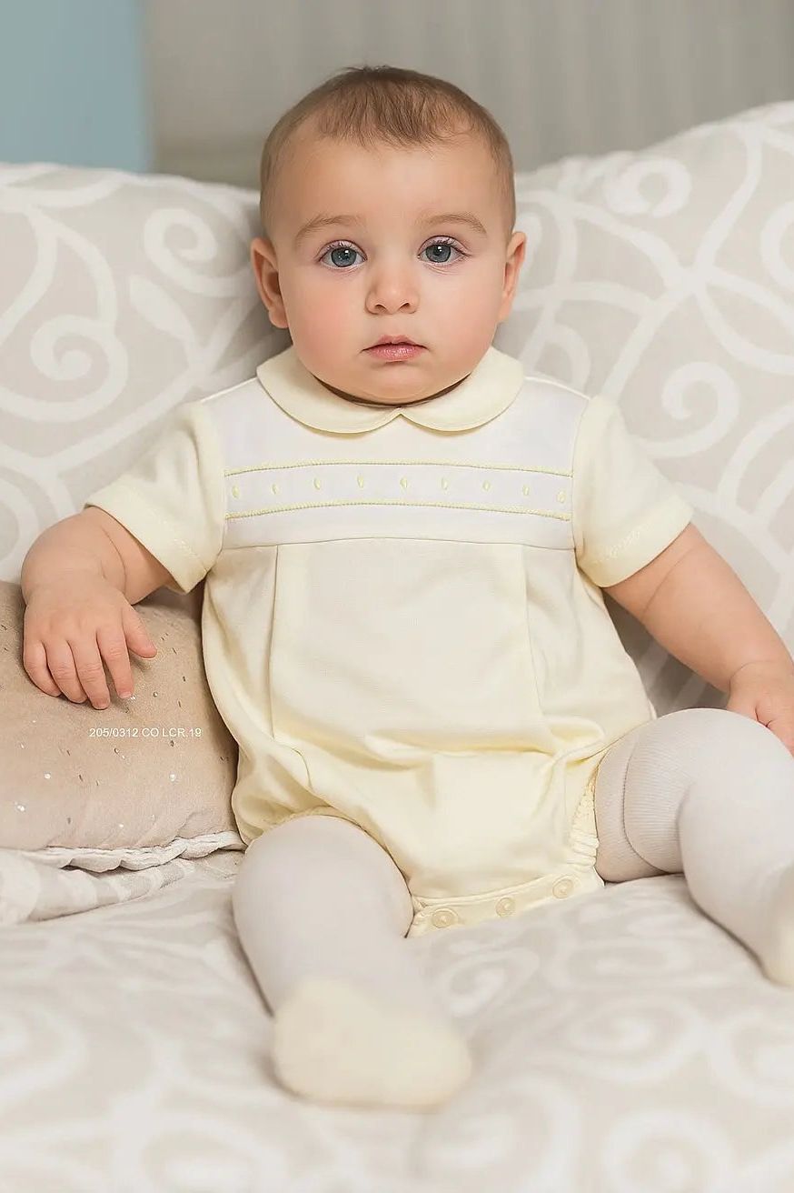 Baby in a lemons spanish baby boys outfit 