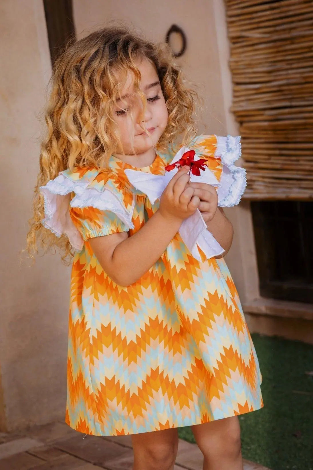 SS25 Rochy Girls Orange Abstract Dress - Dainty Delilah