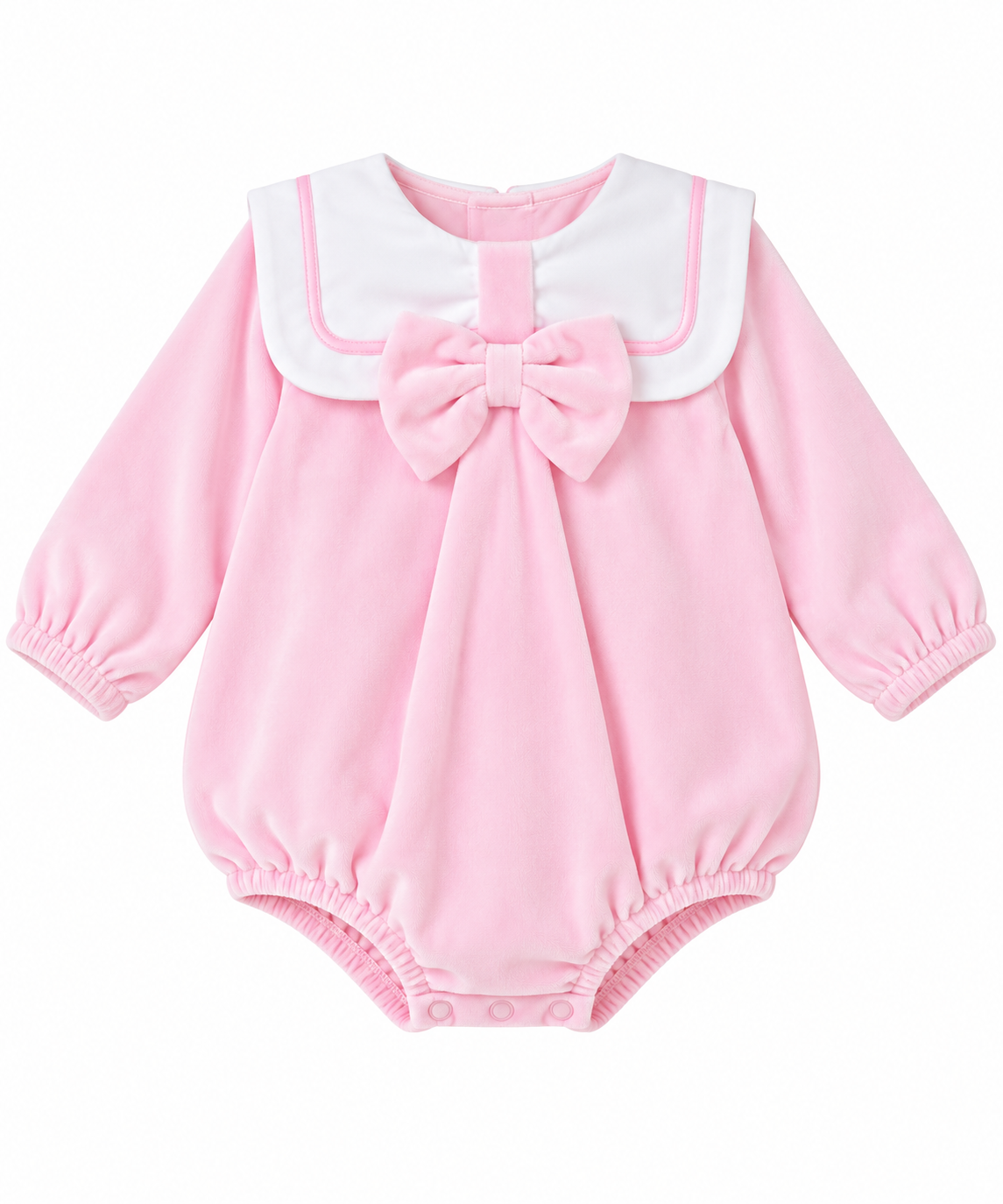 Baby girls’ baby pink velour romper with white sailor collar, pink piping, oversized matching bow and long sleeves on a white background.